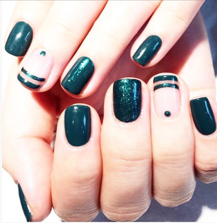 Green nail art with stripes and dots at Live True London Vauxhall and Nine Elms