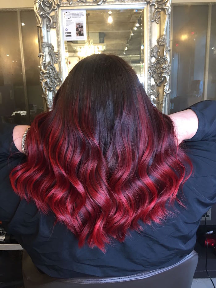 Deep red balayage hair in hair salon in London