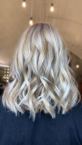 Curly blonde hair at the Clapham hair salon in London