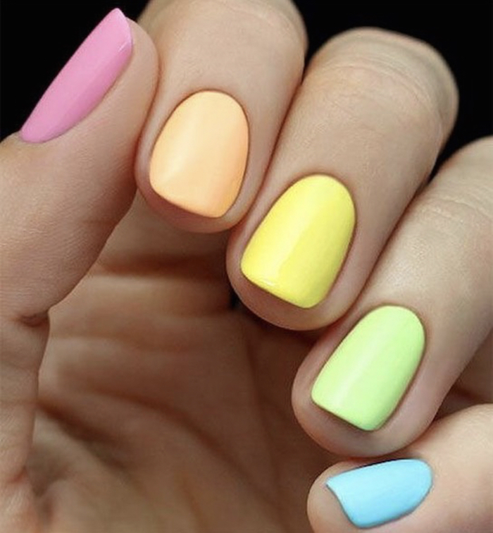 pink, orange, yellow, green and blue nails at London nail salon in Vauxhall and Nine Elms