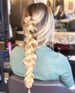 braid at hair salon in Clapham