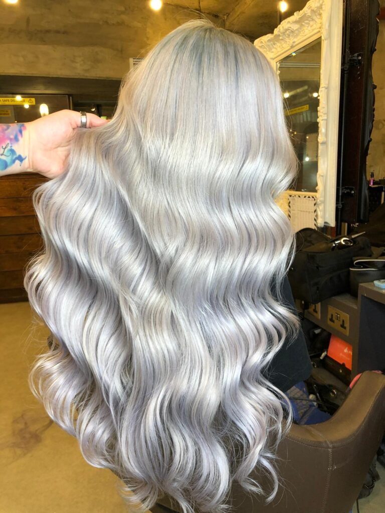 blonde extensions, icy blonde hair, silver hair, silver highlights, extensions, long extensions, bright silver hair