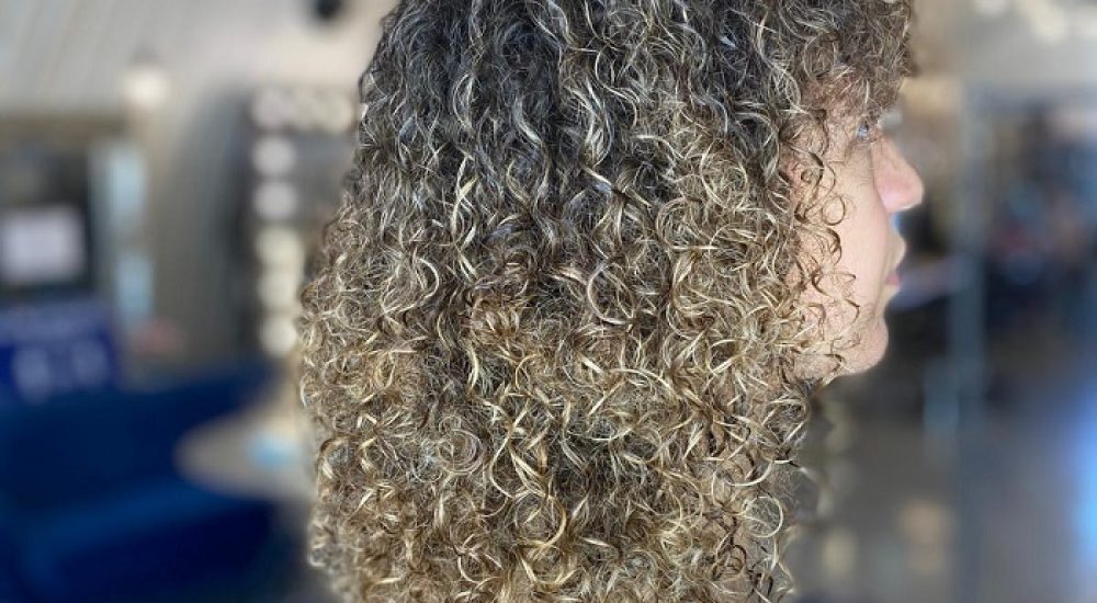 curly hair with moisture at clapham north